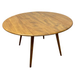 Load image into Gallery viewer, A round wooden dining table with a warm medium-brown finish, featuring a visible wood grain pattern and four tapered legs, shown on a solid white background.
