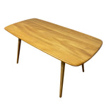 Load image into Gallery viewer, A mid-century modern wooden dining table with a rounded rectangular top, natural oak finish, and tapered legs, shown on a plain white background.
