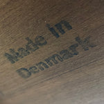 Load image into Gallery viewer, Close-up of engraved text reading 'Made in Denmark' on a dark brown wood surface.
