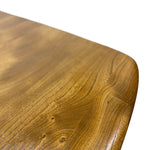 Load image into Gallery viewer, Close-up of a polished wooden tabletop corner with rounded edges and visible natural wood grain on a white background.
