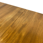 Load image into Gallery viewer, Close-up of a wooden tabletop surface with visible wood grain and a seam between boards, photographed against a white background.
