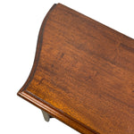Load image into Gallery viewer, Close-up of a curved wooden tabletop corner with a glossy medium-brown wood finish and visible wood grain, photographed on a white background.
