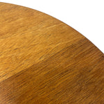 Load image into Gallery viewer, Close-up of a round wooden surface with a warm medium-brown wood grain finish against a white background.
