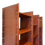 Load image into Gallery viewer, A close-up of a reddish-brown wooden bookshelf with visible dovetail joint construction on the side, shown against a plain white background.
