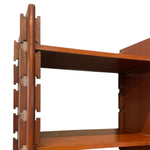 Load image into Gallery viewer, Close-up of a mid-century modern wooden bookshelf or cabinet corner, showcasing interlocking dovetail joints and warm reddish-brown wood grain against a solid white background.
