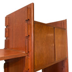 Load image into Gallery viewer, Close-up of a mid-century modern wooden writing desk with dovetail joinery and warm reddish-brown wood grain, set against a plain white background.
