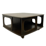 Load image into Gallery viewer, A mid-century modern wooden coffee table with a dark brown wood frame, a light beige top, and open side compartments, shown on a plain white background.
