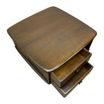 Load image into Gallery viewer, A mid-century modern wooden coffee table with a square top, rounded corners, and two partially open drawers, shown on a solid white background.

