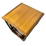Load image into Gallery viewer, A square wooden end table with a warm honey-toned wood grain top and a dark brown curved metal base, shown from an elevated angle on a white background.
