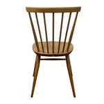 Load image into Gallery viewer, A wooden spindle-back dining chair with a warm medium brown finish, shown from the back against a plain white background.
