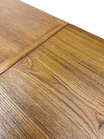 Load image into Gallery viewer, Close-up of a wooden tabletop with visible wood grain and a seam between panels, photographed against a white background.
