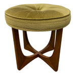 Load image into Gallery viewer, A round tufted velvet stool with a green fabric cushion and a mid-century modern wooden base, shown on a plain white background.
