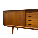 Load image into Gallery viewer, Mid-century modern wooden sideboard cabinet with a sliding door on the left and four drawers on the right, shown against a plain white background.

