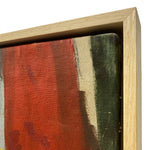 Load image into Gallery viewer, Close-up of a framed abstract canvas painting showing a textured red, beige, and dark green painted surface within a light natural wood frame.
