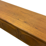 Load image into Gallery viewer, close up of a teak sideboard with a heavy grain
