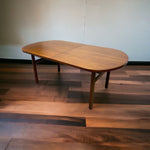 Load image into Gallery viewer, Danish Dining Table Midcentury Extendable Oval On Wooden Floor
