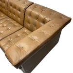 Load image into Gallery viewer, sofa arm buttoned in brown vinyl
