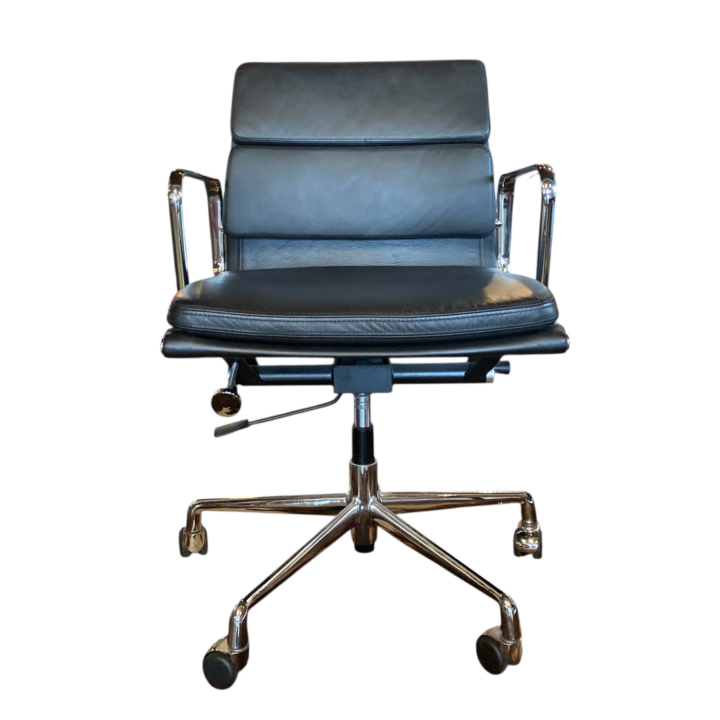 Black vinyl and chrome desk chair on castors