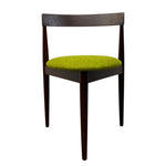 Load image into Gallery viewer, Chair with green cushioned seat and dark wooden frame on a white background
