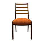 Load image into Gallery viewer, G plan Chair with wooden backrest and orange seat on a white background

