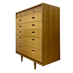 Load image into Gallery viewer, Wooden dresser with multiple drawers on a white background
