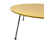 Load image into Gallery viewer, Round wooden table with metal legs on a white background
