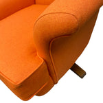 Load image into Gallery viewer, Close-up of an orange armchair with a white background
