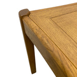 Load image into Gallery viewer, Close-up of a wooden table corner with a white background
