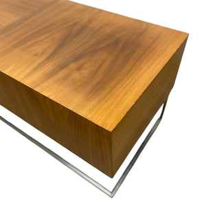 Wooden coffee table with metal legs on a white background