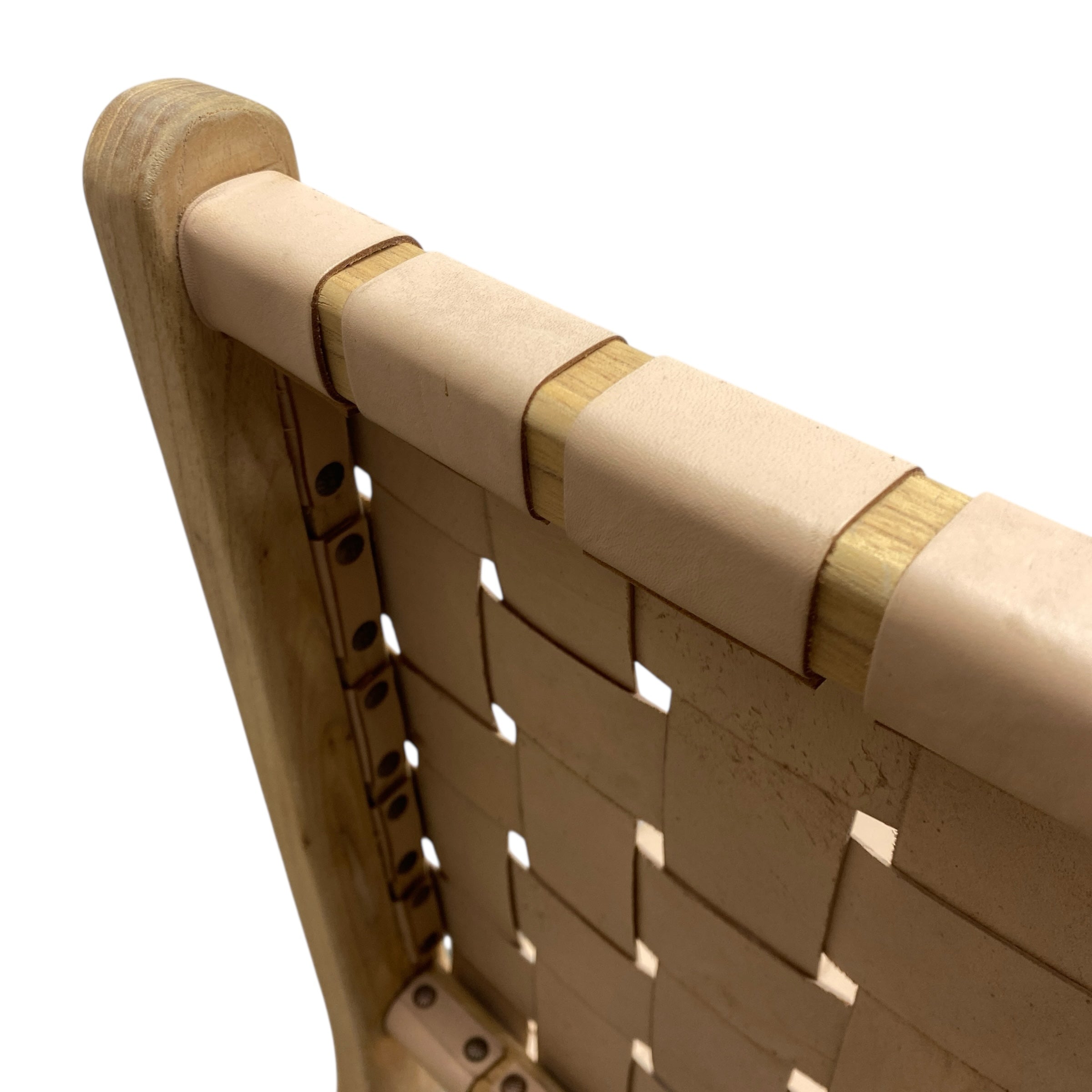 Close-up of a woven chair with wooden frame on a white background