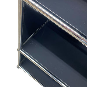 Metal shelf with a reflective surface on a white background