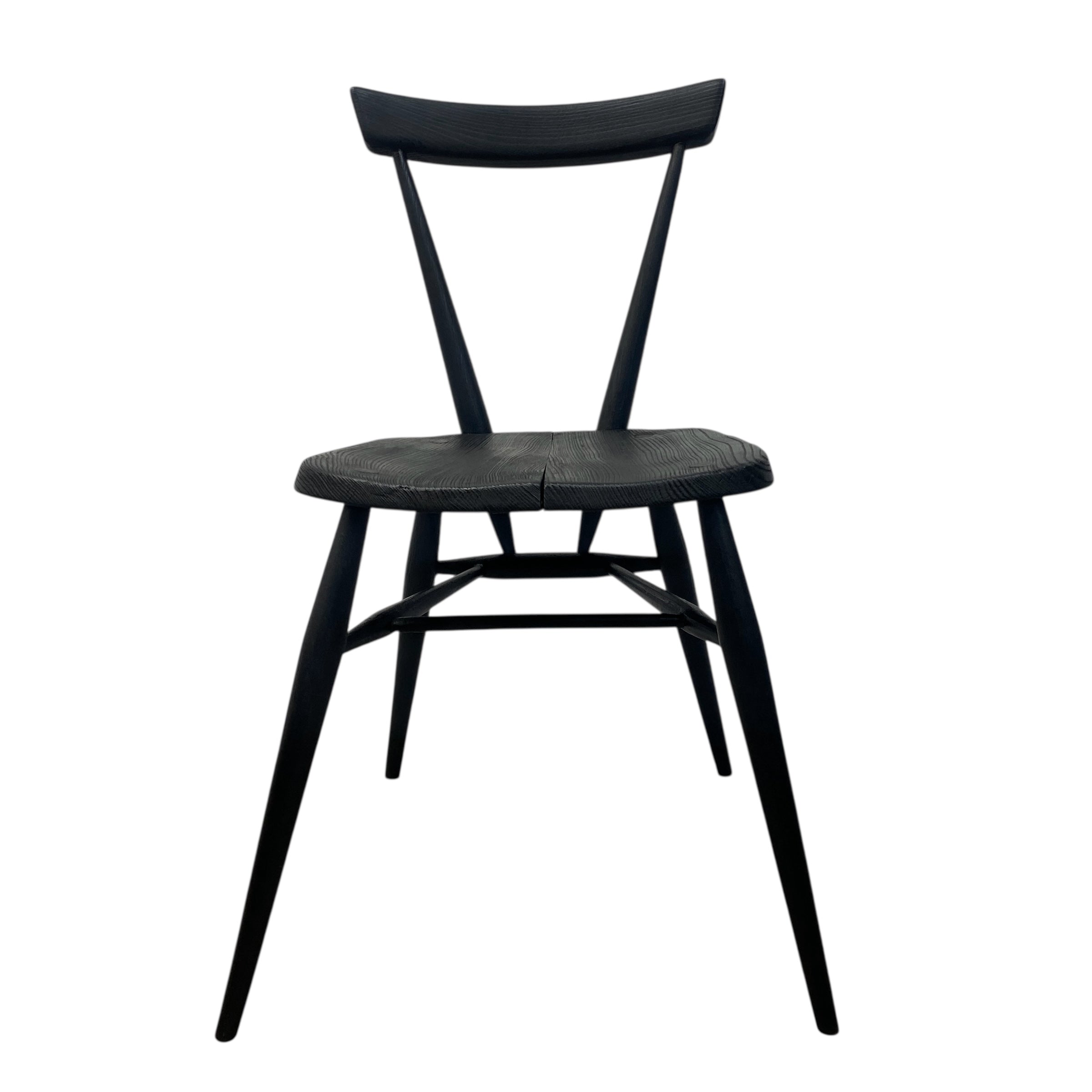 Black wooden chair with woven seat on a white background