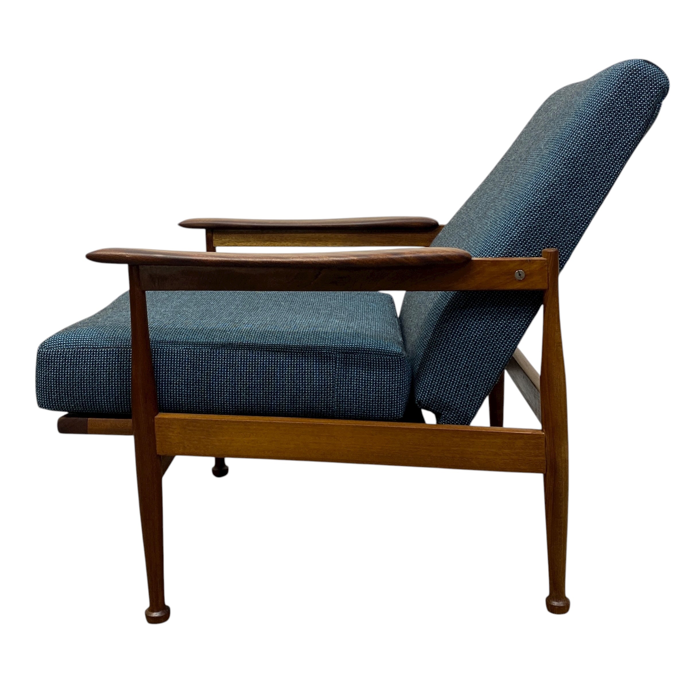 Blue upholstered chair with wooden frame on a white background