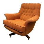 Load image into Gallery viewer, Orange armchair with tufted backrest on a white background
