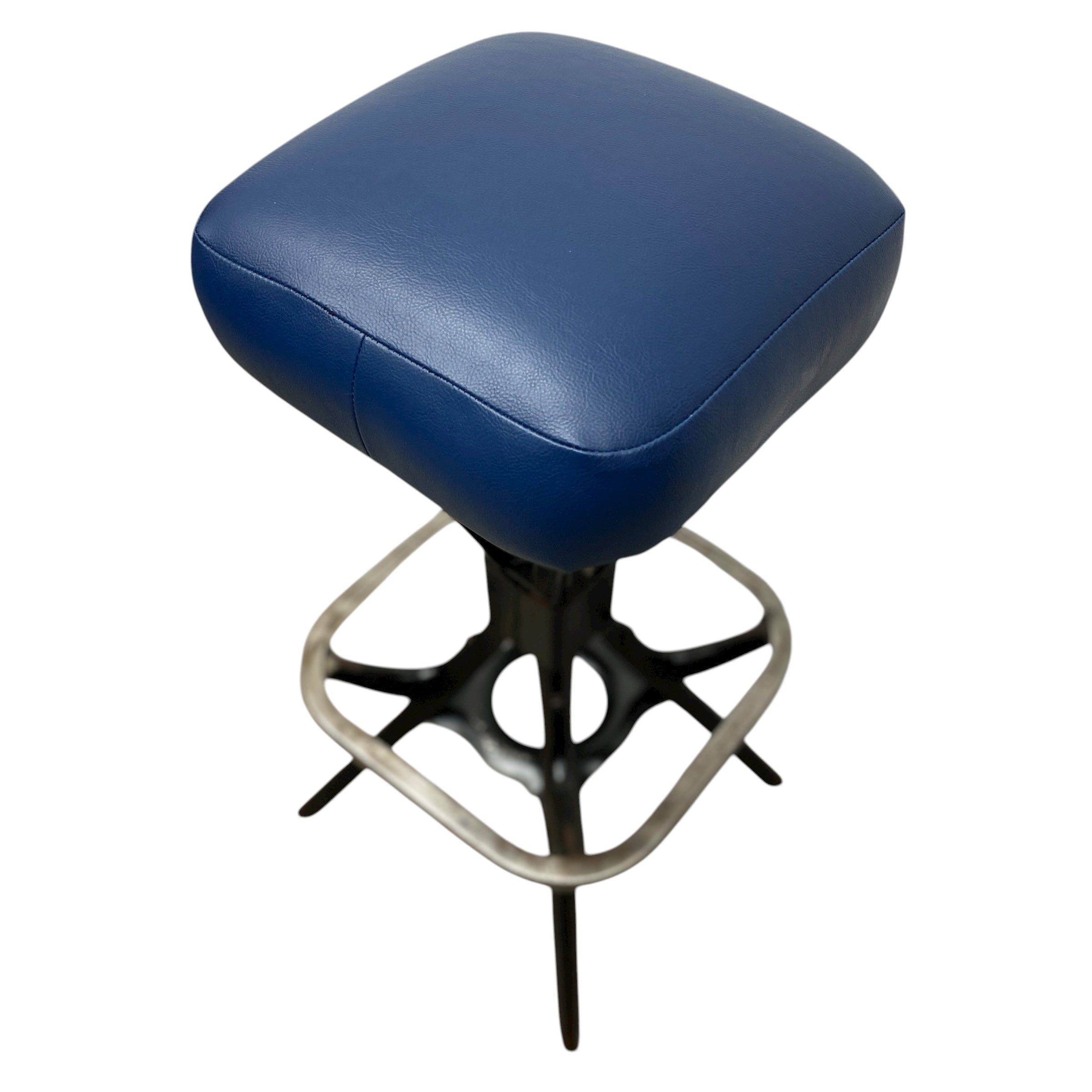 Blue cushioned stool with a unique metal base on a white background