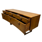 Load image into Gallery viewer, Wooden dresser with multiple drawers on a white background
