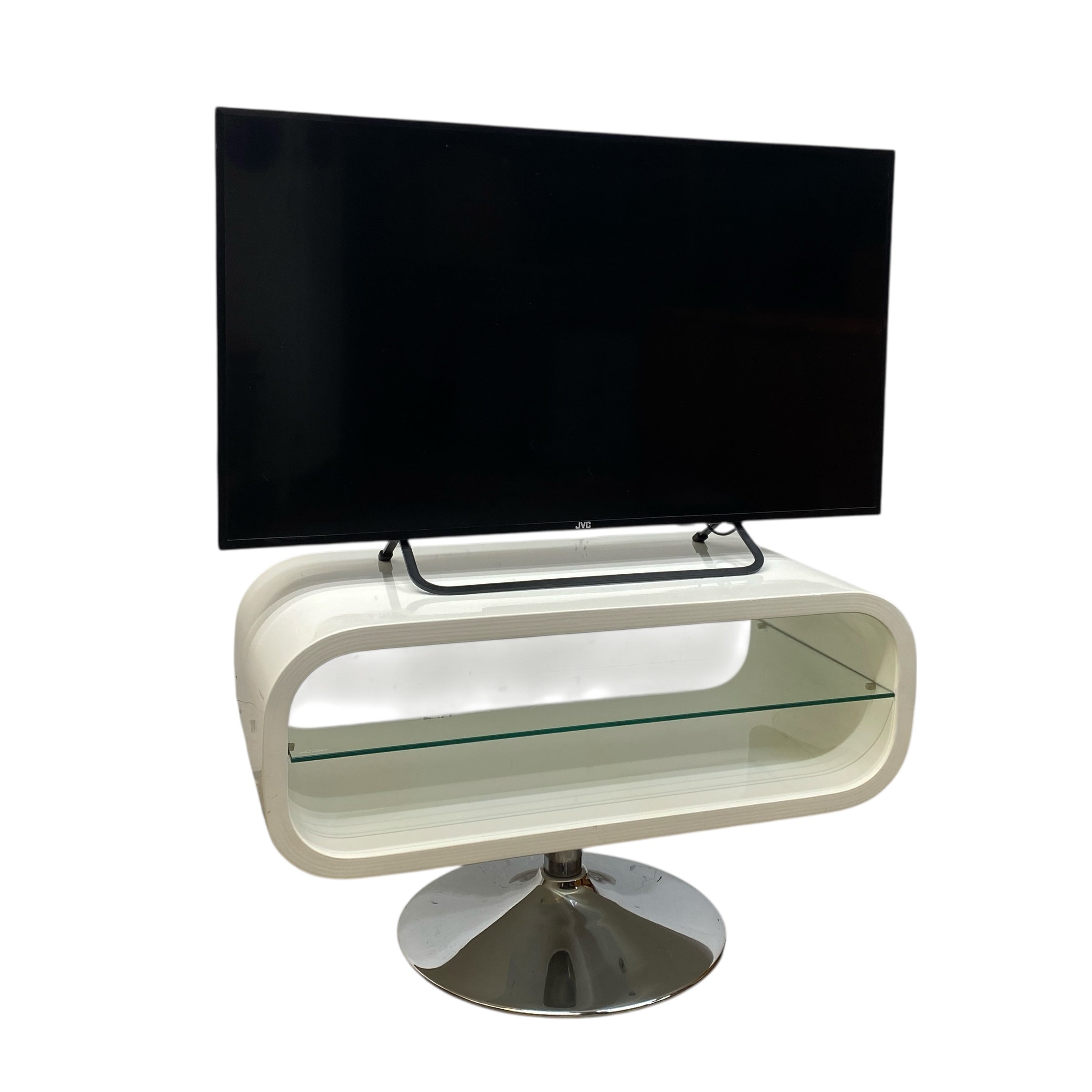 Modern TV stand with a curved design and glass shelf, featuring a television on top.