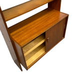 Load image into Gallery viewer, Wooden bookshelf with a door on a white background
