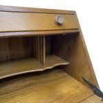 Load image into Gallery viewer, Wooden desk with a drawer open on a white background
