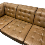 Load image into Gallery viewer, buttoned seating on sofa
