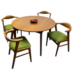 Load image into Gallery viewer, Round wooden table with four matching chairs on a white background
