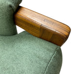 Load image into Gallery viewer, Green upholstered sofa with a wooden armrest on a white background
