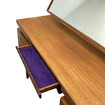 Load image into Gallery viewer, Wooden vanity table with a purple tray inside an open drawer on a white background
