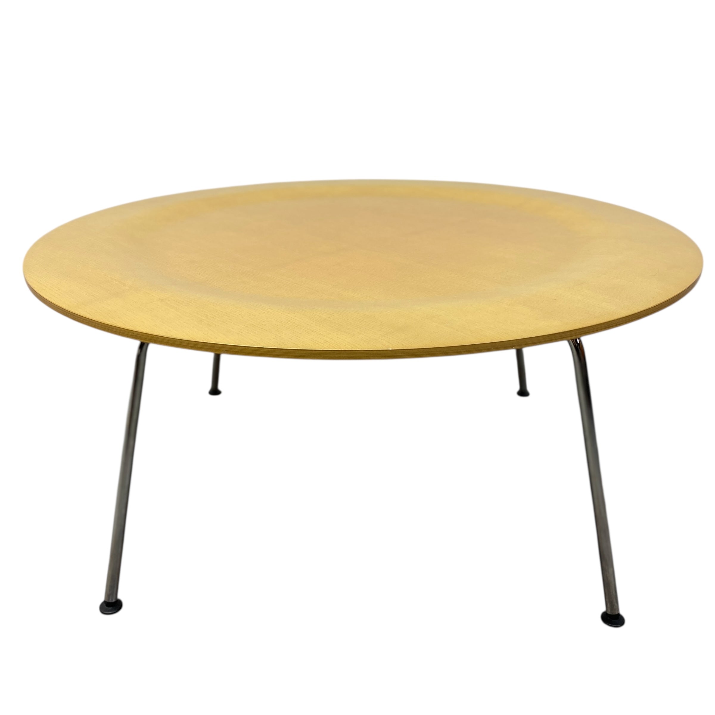 Round wooden table with metal legs on a white background