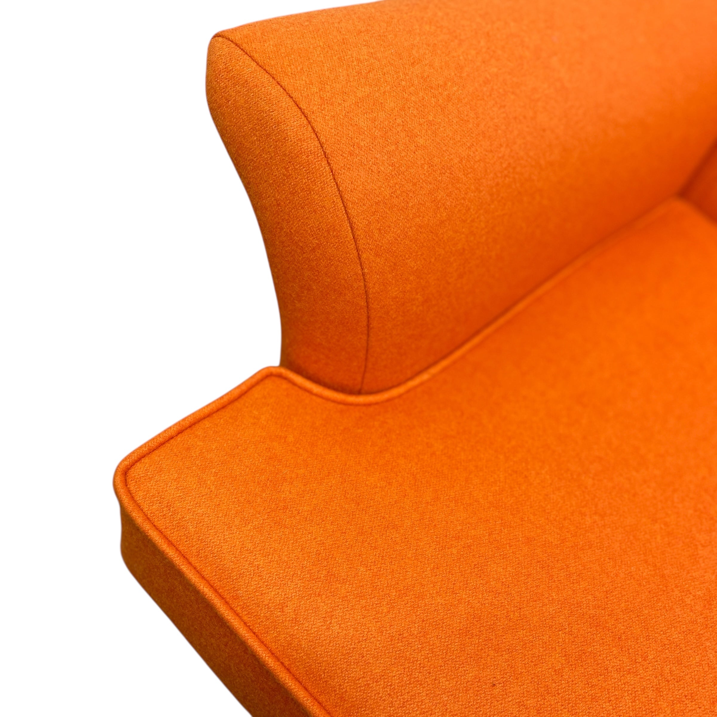 Close-up of an orange cushion on a white background