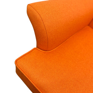 Close-up of an orange cushion on a white background