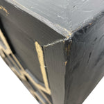 Load image into Gallery viewer, Close-up of a black book corner with gold text on a white background
