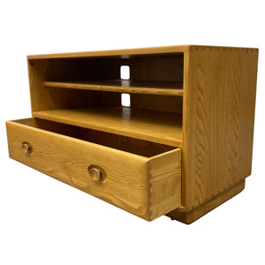 Wooden drawer unit with open drawer on a white background
