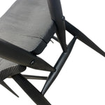 Load image into Gallery viewer, Close-up of a black metal chair with wooden seat on a white background
