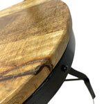 Load image into Gallery viewer, Round wooden table with a black metal base on a white background
